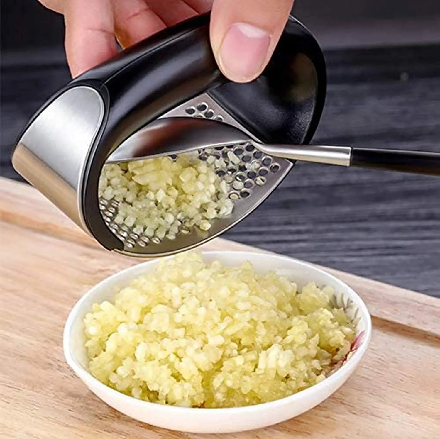 Stainless steel garlic vegetable hand press